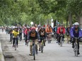 Tour de l'Île cyclists make their way through Ville Emard.