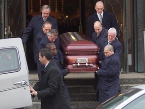The coffin of alleged underworld figure Salvatore Montagna is carried to a car following his funeral at Notre-Dame-de-Pompéi church Nov. 28, 2011. Montagna was fatally shot in Charlemagne, a suburb just east of Montreal.