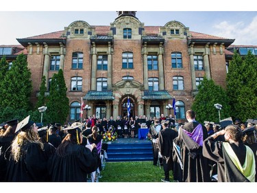 Academic staff and students arrive for commencement of the convocation ceremonies held outdoors in front of the  Hertzberg Building, at John Abbott College in Ste. Anne-de-Bellevue, Quebec on June 11, 2015. Established in 1971, some  2,000 students graduated, with 425 diplomas and honours certificates being awarded.