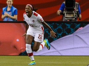 Ashley Lawrence #22 of Canada celebrates her goal in the first half during the 2015 FIFA Women's World Cup Group A match against the Netherlands at Olympic Stadium on June 15, 2015.