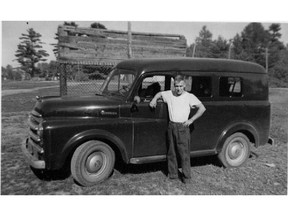1952: Norman Wilkins with his brother's truck. Like most of their peers, the brothers did their own vehicle maintenance.