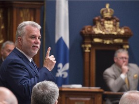 Quebec Premier Philippe Couillard responds to Opposition questions on negotiations with nurses, Thursday, June 11, 2015 at the legislature in Quebec City.