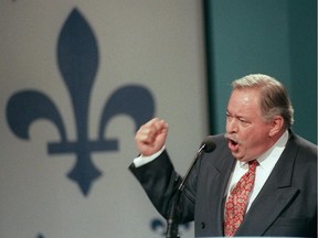 Quebec Premier Jacques Parizeau gestures during his speech to Yes supporters after losing the referendum in Montreal on Oct. 30, 1995. The wife of former Quebec premier Jacques Parizeau says the longtime Quebec sovereigntist icon has died. Lisette Lapointe says the 84-year-old passed away on Monday night after what she called a "titanic fight."