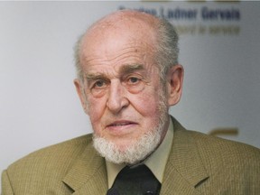 Rejean Hinse speaks to reporters at a news conference in Montreal on April 14, 2011. The Supreme Court of Canada says the federal government doesn't have to pay millions of dollars to a wrongfully convicted man from Quebec. Rejean Hinse was sentenced to 15 years in prison in 1964 for armed robbery he didn't commit.