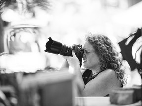 Susan Moss taking photos at the 2014 Montreal Folk Festival