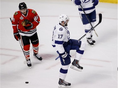 Tampa Bay Lightning's Alex Killorn, right, celebrates as he skates past Chicago Blackhawks' Teuvo Teravainen, of Finland, after scoring during the second period in Game 4 of the NHL hockey Stanley Cup Final Wednesday, June 10, 2015, in Chicago.