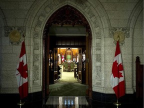 The doors to the House of Commons open awaiting the arrival of the daily Speakers Parade Wednesday June 11, 2014 in Ottawa.