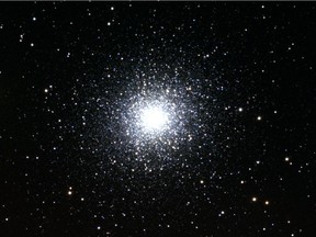 The Great Hercules Cluster is a mass of hundreds of thousands of stars that sits 24,000 light years from Earth and is visible through binoculars and backyard telescopes in June.