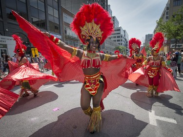 MONTREAL, QUE.: JULY 4, 2015 --  Members of Caribbean community dance down rue Ste. Catherine during the 40th Carifiesta parade in Montreal, on Saturday, July 4, 2015. (Peter McCabe / MONTREAL GAZETTE)