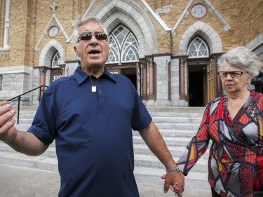 Raymond Lafontaine with his girlfriend Jeanette Gosselin after mass at Paroisse Ste-Agnes in Lac-Megantic, 250 kilometres east of Montreal Sunday July 05, 2015 one day before the 2nd anniversary of the train derailment and fire that destroyed the centre of the town, killing 47 people.  Lafontaine lost his son Gaetan in the fire.