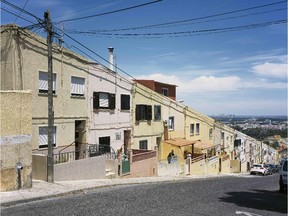 In the port city of Setúbal's Casal das Figueiras neighbourhood, architects had to build houses for fishing families on a slope.