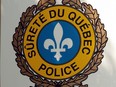 A Sûreté du Québec logo as seen on a vehicle.