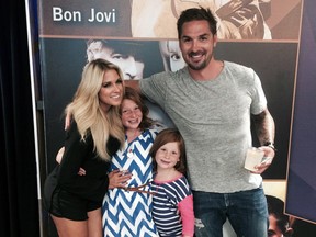 Former Canadiens defenceman Sheldon Souray with his fiancée, Barbie Blank, and his daughters, Valentina (left) and Scarlett, in Las Vegas in September 2014.