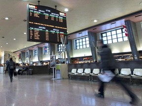 A former Vermont transportation secretary is coming out of retirement to help plan resumption of passenger train service between the northeastern United States and Montreal. Passengers walk through Central Station in Montreal on April 22, 2013.