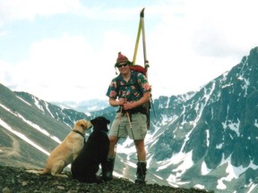 Canadiens fan Chris McNeill on Montana Mountain in Carcross, Yukon in July 2003 with his two dogs, Finn and Emmit. McNeill died of metastatic liver cancer at age 48. Photo courtesy of McNeill family