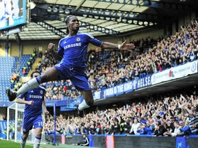 Didier Drogba celebrates after scoring the opening goal of English Premier League game against Stoke City at Stamford Bridge in London on March 10, 2012.