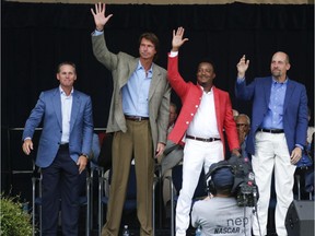 National Baseball Hall of Fame electees Craig Biggio, Randy Johnson, Pedro Martinez and John Smoltz are introduced during an awards ceremony at Doubleday Field on Saturday, July 25, 2015, in Cooperstown, N.Y. The former major league players will be inducted on Sunday.