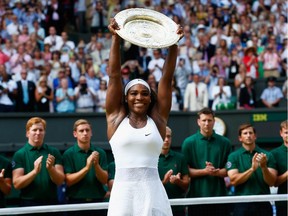 Serena Williams of the United States celebrates with the Venus Rosewater Dish after her victory in the Final Of The Ladies' Singles against Garbine Muguruza of Spain during day twelve of the Wimbledon Lawn Tennis Championships at the All England Lawn Tennis and Croquet Club on July 11, 2015 in London, England.