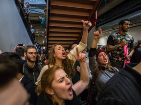 Students shout in support of the protesters arrested at UQAM for disrupting classes, a violation of a court injunction, in Montreal on Wednesday, April 8, 2015.