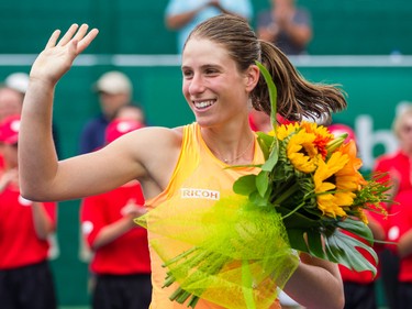 Johanna Konta of Great Britain waves to fans after beating Stephanie Foretz of France in the women's final of the National Bank Granby Challenger tennis tournament in Granby, south of Montreal on Sunday, July 26, 2015.