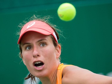 Johanna Konta of Great Britain keeps her eyes on the ball as she hits a return against Stephanie Foretz of France during the women's final of the National Bank Granby Challenger tennis tournament in Granby, south of Montreal on Sunday, July 26, 2015.