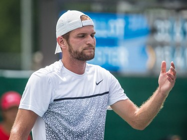 Philip Bester of Canada reacts after losing a point against Vincent Millot of France during the men's final of the National Bank Granby Challenger tennis tournament in Granby, south of Montreal on Sunday, July 26, 2015.