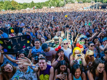 Music fans enjoy the performance by Marina and the Diamonds on day one of the 2015 edition of the Osheaga Music Festival at Jean-Drapeau park in Montreal on Friday, July 31, 2015.