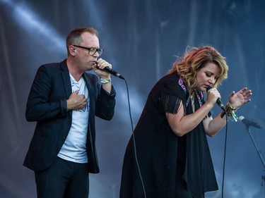 Torquil Campbell, left, and Amy Millan, right, of the band Stars perform on day one of the 2015 edition of the Osheaga Music Festival at Jean-Drapeau park in Montreal on Friday, July 31, 2015. (Dario Ayala / Montreal Gazette)