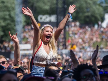 A music fan cheers during the performance by George Ezra on day one of the 2015 edition of the Osheaga Music Festival at Jean-Drapeau park in Montreal on Friday, July 31, 2015.