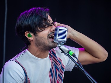 Sameer Gadhia of Young the Giant performs on the second day of the 2015 edition of the Osheaga music festival at Jean-Drapeau park in Montreal on Saturday, August 1, 2015.
