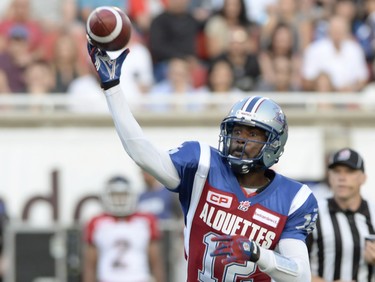 Montreal Alouettes quarterback Rakeem Cato throws for a touchdown against the Calgary Stampeders during first half CFL football action in Montreal, Friday July 3, 2015. THE CANADIAN PRESS/Ryan Remiorz