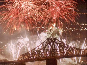 FIREWORKS COMPETITION AT LA RONDE AS VIEWED ABOVE JACQUES CARTIER BRIDGE.