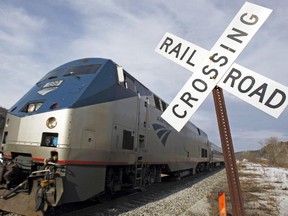 In this March 11, 2013 photo, the Amtrak Vermonter heads south in Middlesex, Vt.