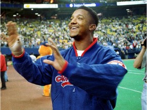 Expos pitcher Pedro Martinez waves to fans at Olympic Stadium on Sept. 28, 1997, after his final game in Montreal. The future Hall of Famer was traded to the Boston Red Sox later that year.