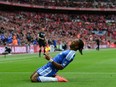 Chelsea's Didier Drogba celebrates after scoring goal during FA Cup final against Liverpool at London's Wembley Stadium on May 5, 2012.