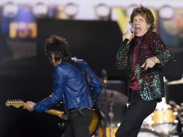 The Rolling Stones singer Mick Jagger perform in concert during the Quebec Summer Festival Wednesday, July 15, 2015 in Quebec City.