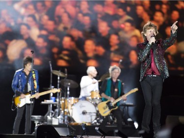 The Rolling Stones singer Mick Jagger perform in concert during the Quebec Summer Festival Wednesday, July 15, 2015 in Quebec City.