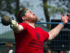 Will Barron from Belgrade, Maine, throws a 28-pound weight during competition at the 37th edition of the Montreal Highland Games, at Arthur-Therrien Park in Verdun, Montreal, Sunday, August 3, 2014.