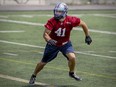 Linebacker Kyler Elsworth, 41, follows the play during Montreal Alouettes practice at Stade Hébert in Montreal Wednesday July 8, 2015. Elsworth is expected to replace the injured Bear Woods in the Alouettes lineup.
