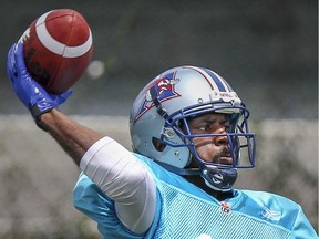 Montreal Alouettes quarterback Rakeem Cato passes the football during practice at Stade Hebert in Montreal Wednesday July 8, 2015.