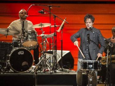 jazz-pop singer and songwriter Jamie Cullum plays the drums during the opening number at Maison symphonique de Montréal during the Montreal International Jazz Festival in Montreal, on Wednesday, July 1, 2015.