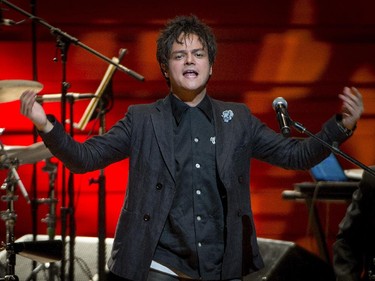 jazz-pop singer and songwriter Jamie Cullum encourages the audience to clap along during the opening number at Maison symphonique de Montréal during the Montreal International Jazz Festival in Montreal, on Wednesday, July 1, 2015.