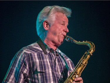 Johnny Colla of Huey Lewis and the news plays sax during their concert at Salle Wilfrid-Pelletier of Place des Arts during the Montreal International Jazz Festival in Montreal, on Wednesday, July 1, 2015.