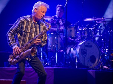 Johnny Colla of Huey Lewis and the news plays sax with Bill Gibson on drums during their concert at Salle Wilfrid-Pelletier of Place des Arts during the Montreal International Jazz Festival in Montreal, on Wednesday, July 1, 2015.