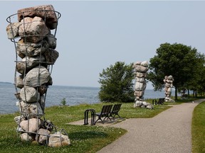 A row of stone filled boots made of reinforcing rod are part of a collection of almost 50 items along Lake St-Louis in Lachine.