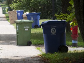 Bins for recyclable and compostable waste line St-Jean Boulevard in Pointe Claire.
