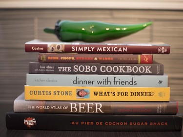Detail of cookbooks from in the kitchen of Erin Lefler and Octavio Mateus' condo on Notre Dame St, in Montreal, Quebec, July 14, 2015. This couple, who loves to entertain, are undergoing renovations to their 1,000 sq. ft condo.  Christinne Muschi / MONTREAL GAZETTE)