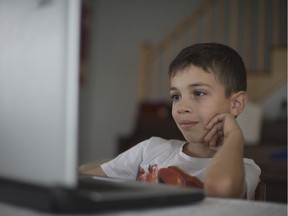 Eight-year-old Julian Sarli, at home in St-Laurent on July 14, learned Scratch coding  as part of a pilot program at Cedarcrest Elementary School.