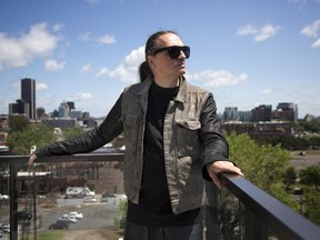 Montreal fashion designer Denis Gagnon on the rooftop of his condo building in Griffintown. The designer is moving his shop and atelier to the Arsenal, on the western edge of the area. Montreal, Thursday July 2, 2015.  (Vincenzo D'Alto / Montreal Gazette)
