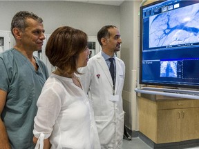 In a Quebec first, a group of researchers at the McGill University Health Centre have conducted the first islet cell transplant in Quebec by infusing a Type I diabetes patient, Zohra Nabbus, with insulin-producing cells, avoiding the need for an organ transplant. Abvove: Nablus with Dr. Steven Paraskevas, director of the Pancreas and Islet Transplant Program, right, and Dr. Benoit Gallix, director of Radiology at the MUHC, on Wednesday, July 22, 2015.